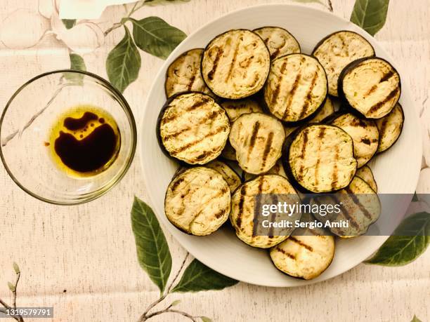 sliced grilled eggplants and oil and vinegar dip - eggplant stock pictures, royalty-free photos & images