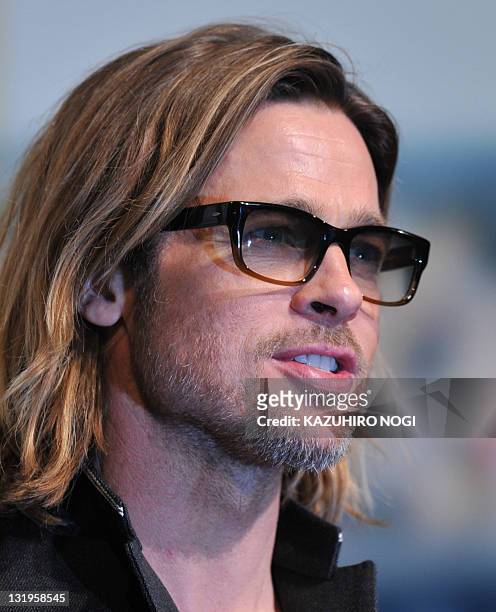 Actor Brad Pitt speaks during the Japan premiere of his latest film "Moneyball' in Tokyo on November 9, 2011. The film will tour nation-wide from...