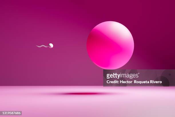 color image of sperm inseminated egg, life concept - sperm stock pictures, royalty-free photos & images