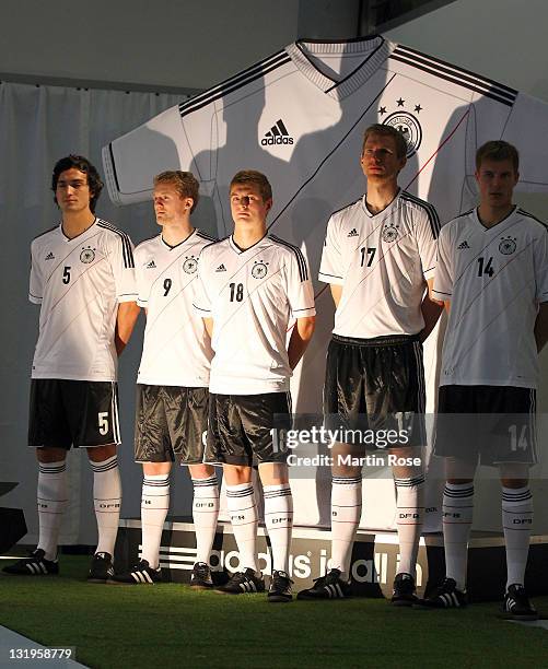 Mats Hummels, Andre Schuerrle , Toni Kroos, Per Mertesacker Holger Badstuber pose with the new Jersey during the Germany national team Euro 2012...