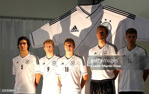 Mats Hummels, Andre Schuerrle , Toni Kroos, Per Mertesacker Holger Badstuber pose with the new Jersey during the Germany national team Euro 2012...