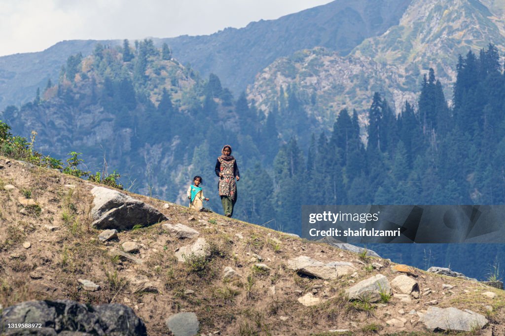 Kasmiri people at beautiful mountain landscape of Naranaq, Jammu and Kashmir state