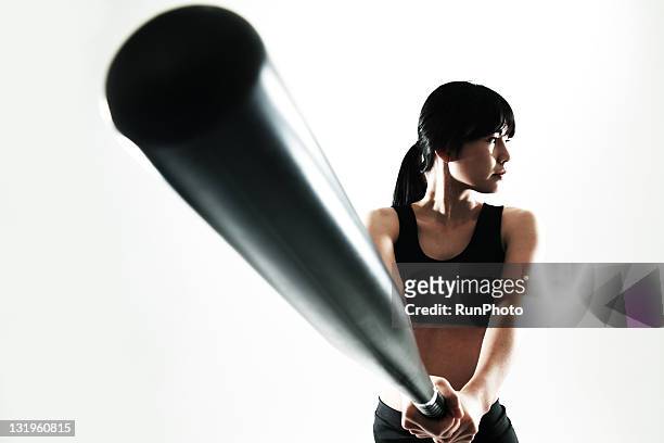 young woman training,baseball - baseball bat ストックフォトと画像