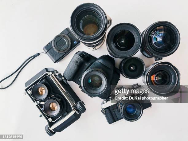 camera and lens - attrezzatura fotografica foto e immagini stock