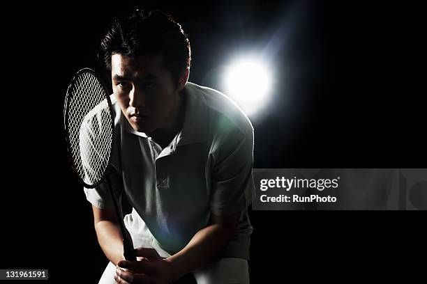 young man training,badminton - badminton sport stock pictures, royalty-free photos & images