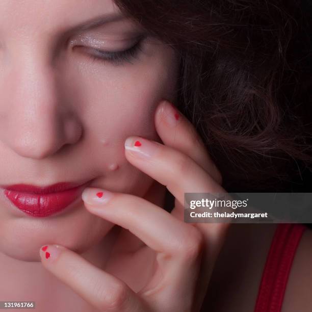 quiet contemplation of her heart - heart nail art stock pictures, royalty-free photos & images