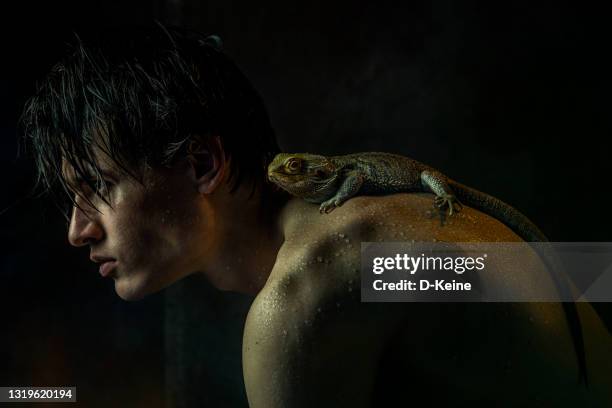 Man Riding A Lizard 1,228 The Lizard Man Stock Photos, High-Res Pictures, and Images ...