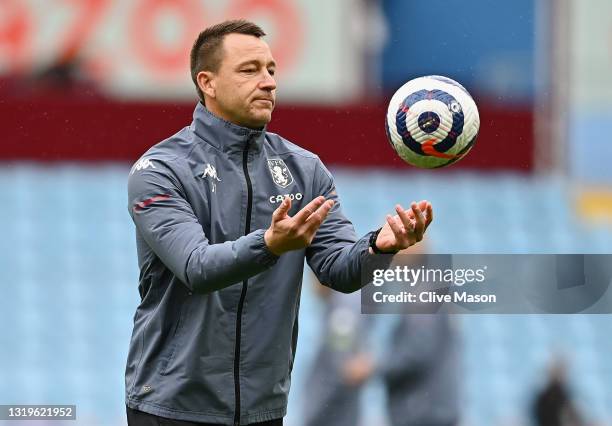 John Terry, Assistant Head Coach of Aston Villa warms his side up prior to the Premier League match between Aston Villa and Chelsea at Villa Park on...