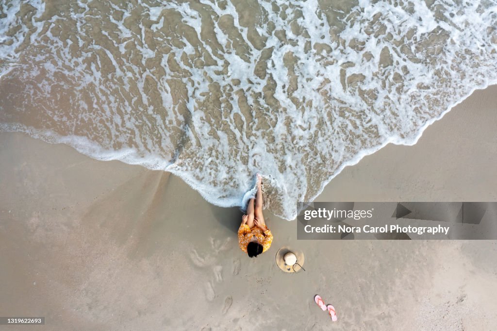 Woman at the Beach Drone Point of View