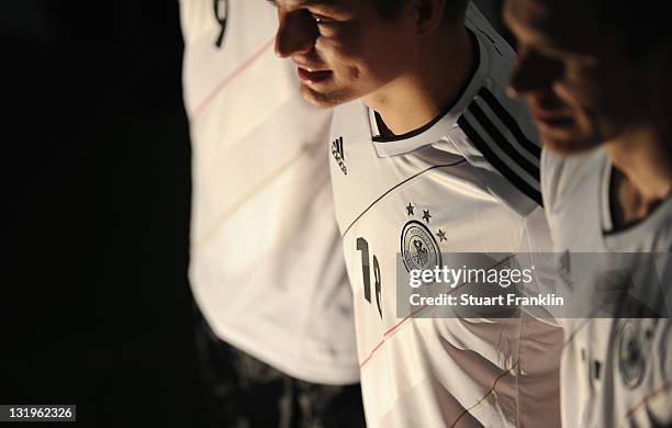 Players model shirts during the German national team Euro 2012 jersey launch at teh Mercedes Benz center on November 9, 2011 in Hamburg, Germany.