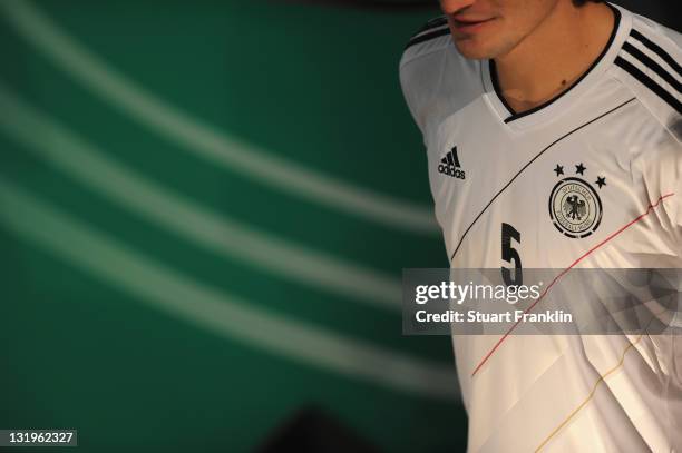 Players model shirts during the German national team Euro 2012 jersey launch at the Mercedes Benz center on November 9, 2011 in Hamburg, Germany.