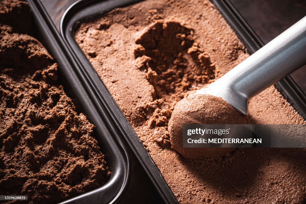 Chocolate ice cream scoop ball serving ice-cream macro close-up