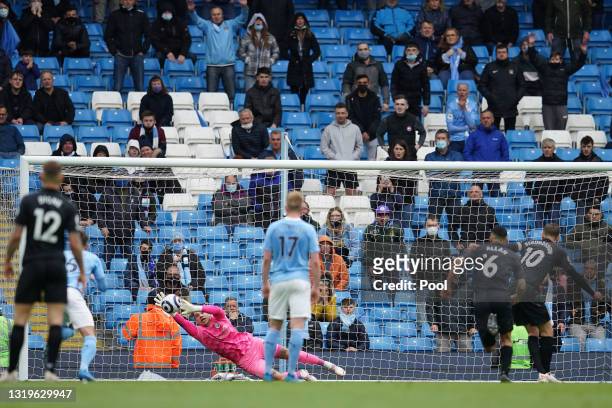 Ederson of Manchester City saves a penalty from Gylfi Sigurdsson of Everton during the Premier League match between Manchester City and Everton at...