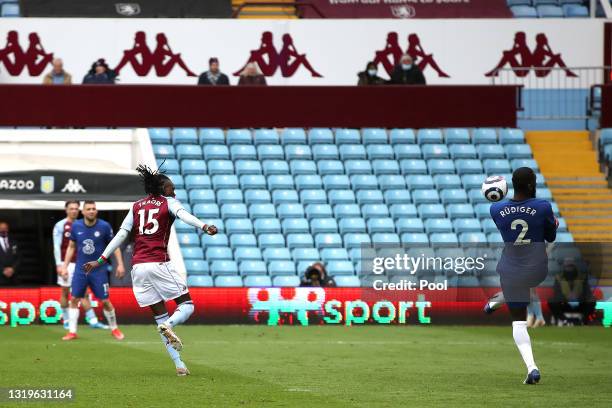 Bertrand Traore of Aston Villa scores their side's first goal during the Premier League match between Aston Villa and Chelsea at Villa Park on May...