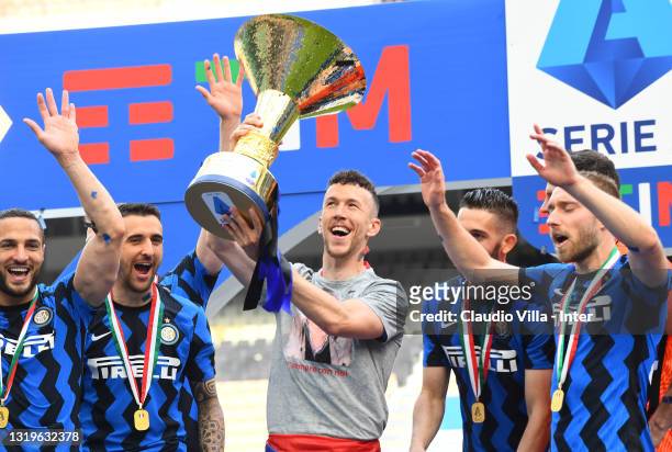 Ivan Perisic of FC Internazionale with the trophy after winning the italian Serie A Football match of the season between FC Internazionale Milano and...