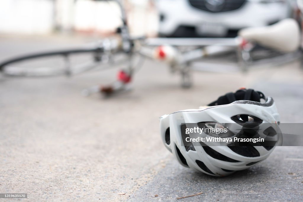 Accident car crash with bicycle on road