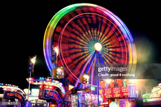 big wheel with trail lights - traveling carnival stockfoto's en -beelden