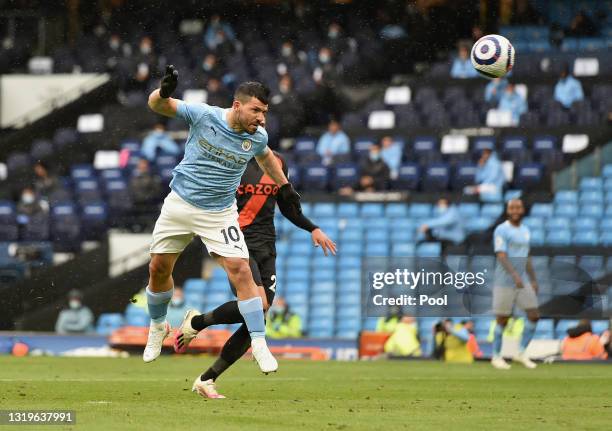 Sergio Aguero of Manchester City scores his team's fifth goal during the Premier League match between Manchester City and Everton at Etihad Stadium...