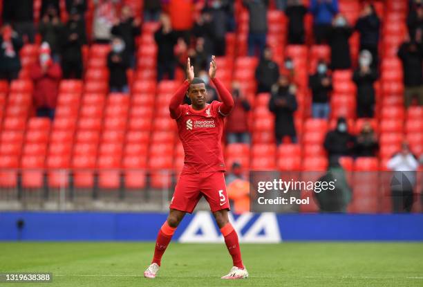 Georginio Wijnaldum of Liverpool applauds the fans as he is substituted during the Premier League match between Liverpool and Crystal Palace at...