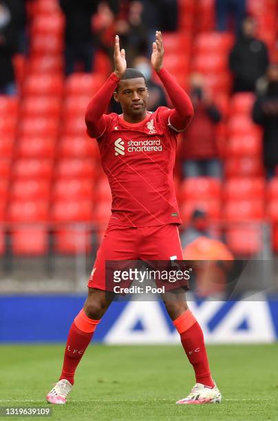 Georginio Wijnaldum of Liverpool applauds the fans as he is substituted during the Premier League match between Liverpool and Crystal Palace at...