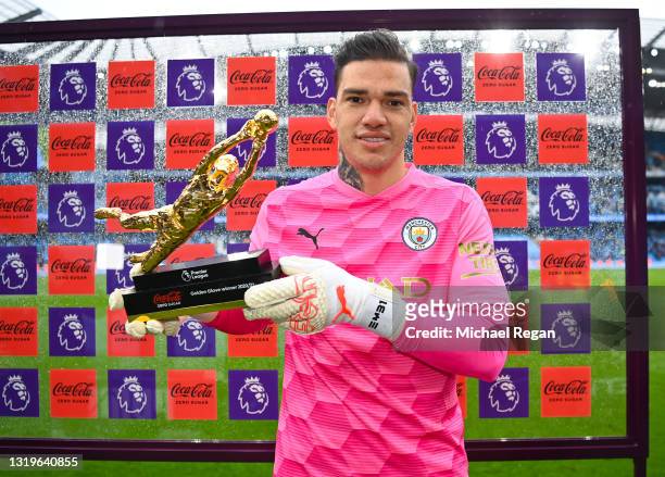 Ederson of Manchester City poses with his Coca-Cola Zero Sugar Golden Glove Winner award following his team's victory in the Premier League match...