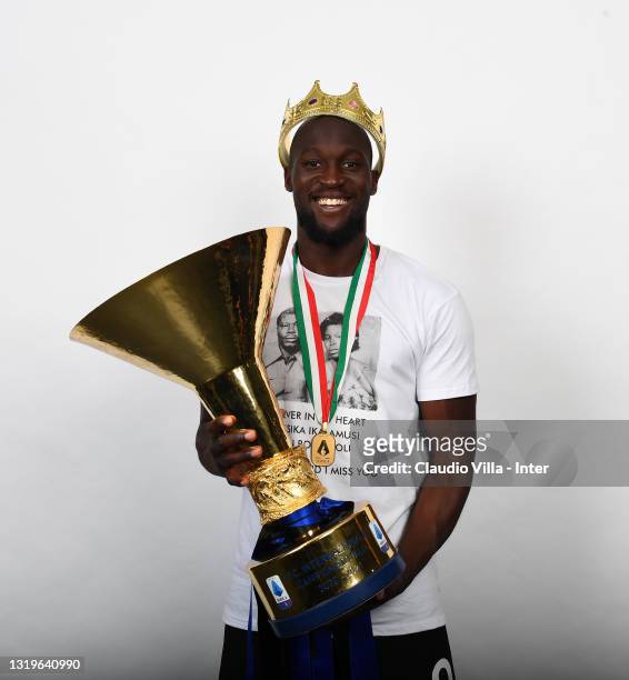 Romelu Lukaku of FC Internazionale poses with the trophy for the victory of "scudetto" at the end of the last Serie A match between FC Internazionale...