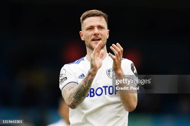 Liam Cooper of Leeds United acknowledges the fans following the Premier League match between Leeds United and West Bromwich Albion at Elland Road on...