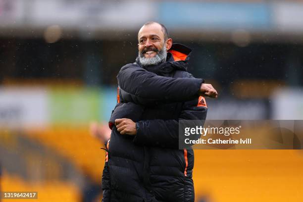 Nuno Espirito Santo, Manager of Wolverhampton Wanderers celebrates with the fans after his last match following the Premier League match between...
