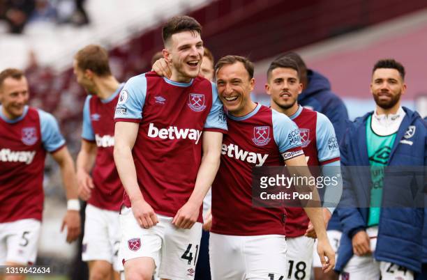 Declan Rice and Mark Noble of West Ham United celebrate following the Premier League match between West Ham United and Southampton at London Stadium...