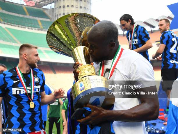 Romelu Lukaku of FC Internazionale poses with the trophy for the victory of "scudetto" at the end of the last Serie A match between FC Internazionale...