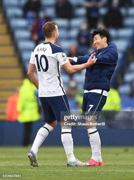 Harry Kane of Tottenham Hotspur interacts with Son Heung-Min of Tottenham Hotspur following the Premier League match between Leicester City and...