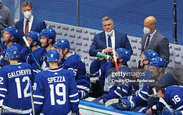 Head coach Sheldon Keefe of the Toronto Maple Leafs seems pleased with a goal challenge denial against the Montreal Canadiens in Game Two of the...