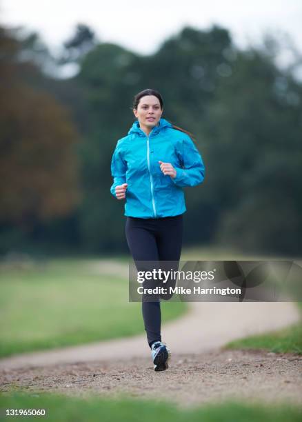 female runner - running woman ストックフォトと画像