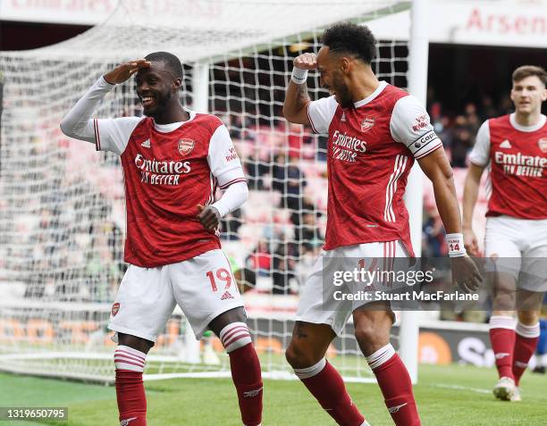 Nicolas Pepe celebrates scoring the 1st Arsenal goal with Pierre-Emerick Aubameyang during the Premier League match between Arsenal and Brighton &...