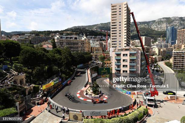 Max Verstappen of the Netherlands driving the Red Bull Racing RB16B Honda leads Valtteri Bottas of Finland driving the Mercedes AMG Petronas F1 Team...