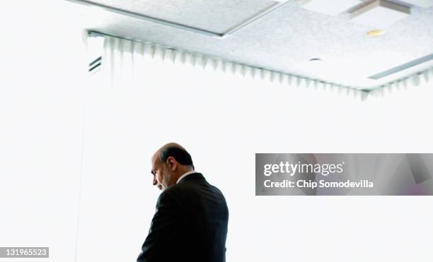 Federal Reserve Chairman Ben Bernanke leaves after delivering opening remarks during a conference on small businss and entrepreneurship at the...