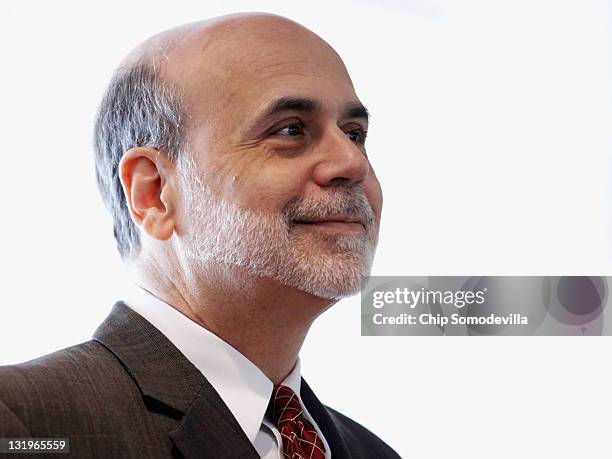 Federal Reserve Chairman Ben Bernanke prepares to deliver opening remarks during a conference on small businss and entrepreneurship at the Federal...