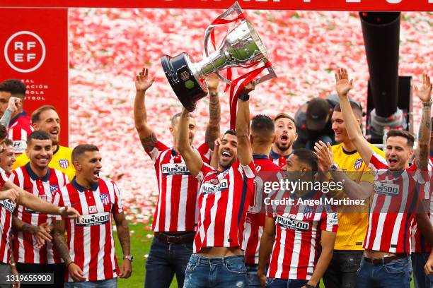 Luis Suarez of Atletico de Madrid celebrates with La Liga trophy during the trophy presentation at Estadio Wanda Metropolitano on May 23, 2021 in...