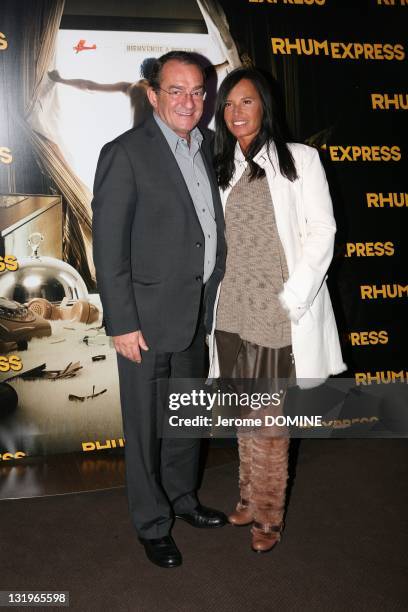 Jean-Pierre Pernaut and Nathalie Marquay attend the 'Rhum Express' Paris Premiere at Cinema Gaumont Marignan on November 8, 2011 in Paris, France.