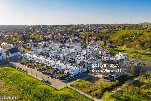 germany, baden-wurttemberg, waiblingen, aerial view of modern suburb with energy efficient single andmulti family houses - housing development stock-fotos und bilder