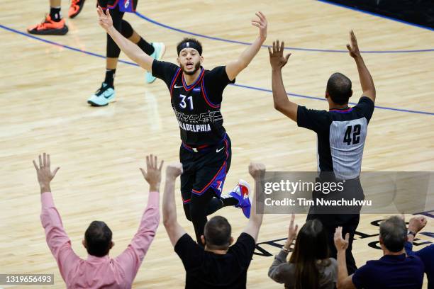 Seth Curry of the Philadelphia 76ers celebrates during the third quarter against the Washington Wizards during Game One of the Eastern Conference...