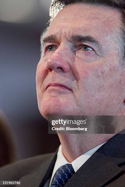 Dennis Lockhart, president of the Federal Reserve Bank of Atlanta, listens as Ben S. Bernanke, chairman of the U.S. Federal Reserve, speak at a small...