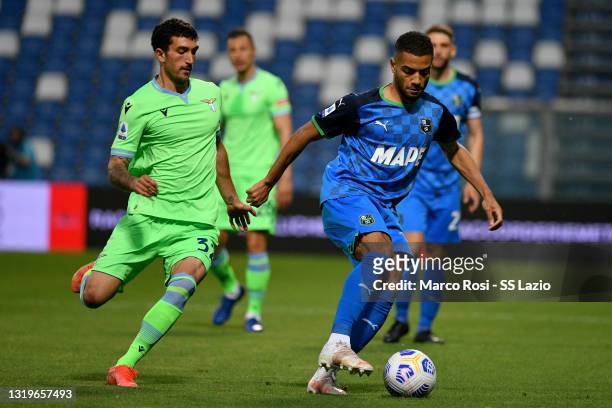 Danilo Cataldi of SS Lazio compete for the ball with Jeremy Toljan of US Sassuolo during the Serie A match between US Sassuolo and SS Lazio at Mapei...