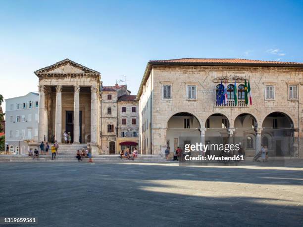 croatia, istria county, pula, town square in front of temple of augustus - pula stock-fotos und bilder