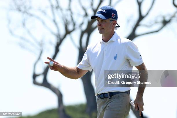 Kevin Streelman of the United States waves on the third green during the final round of the 2021 PGA Championship held at the Ocean Course of Kiawah...