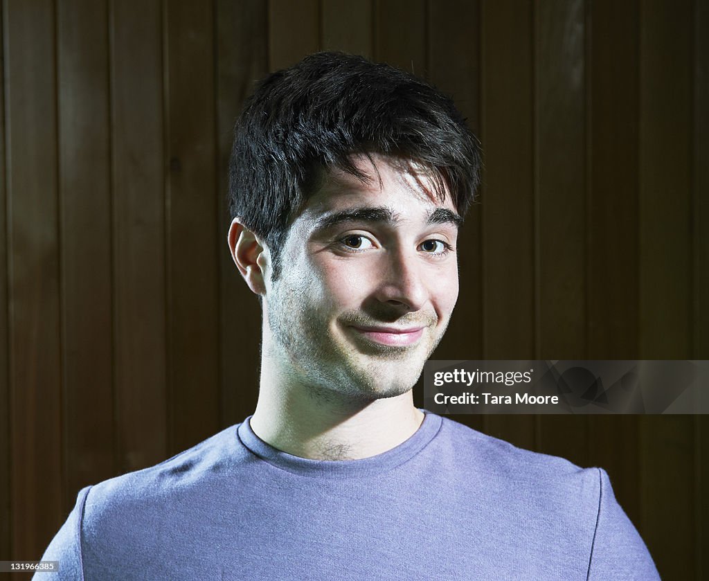 Young man smiling to camera