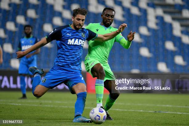 Aniel Akpa Akrp of SS Lazio competes for the ball with Giorgos Kyriakopoulos of US Sassuolo during the Serie A match between US Sassuolo and SS Lazio...