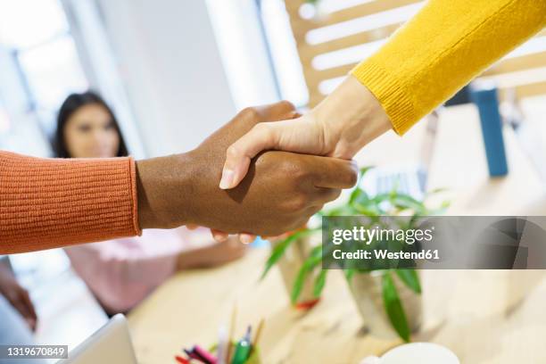 Multi Handshake Three Hand Handshake Photos and Premium High Res Pictures - Getty Images
