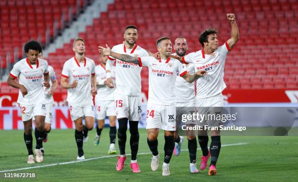 Alejandro Gomez of Sevilla FC celebrates after scoring their team's first goal with Oliver Torres during the La Liga Santander match between Sevilla...