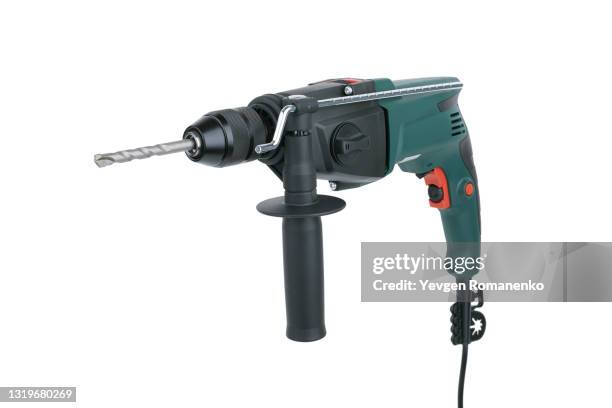 hammer drill isolated on white background - drill stockfoto's en -beelden